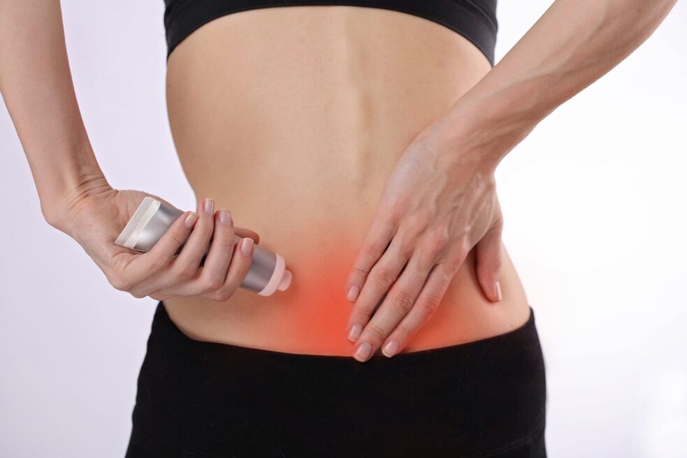 application of ointment to the lower back for osteochondrosis